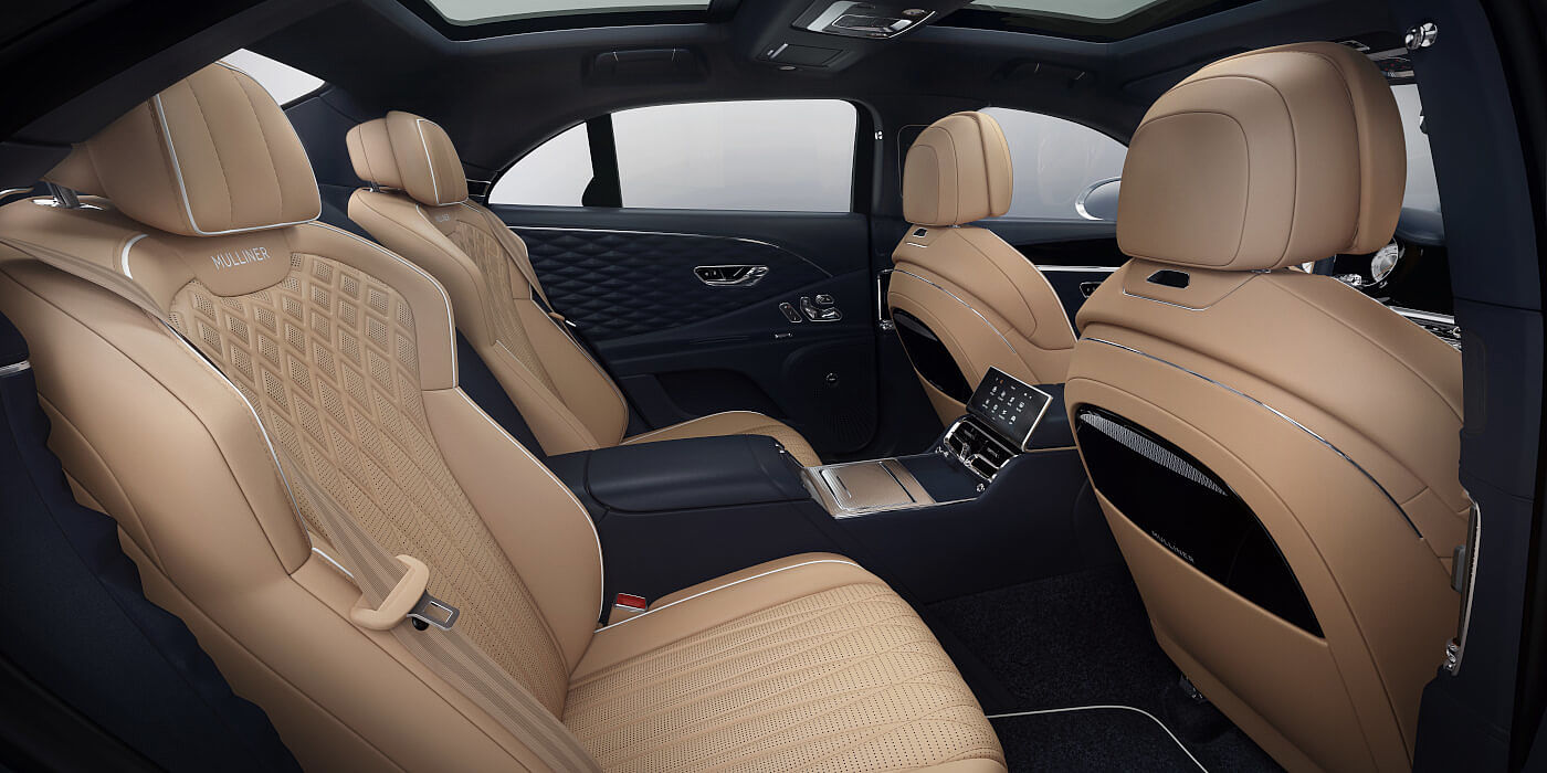 Bentley-Flying-Spur-Mulliner-rear-interior-in-Camel-and-Imperial-Blue-hides-and-3D-diamond-leather-door