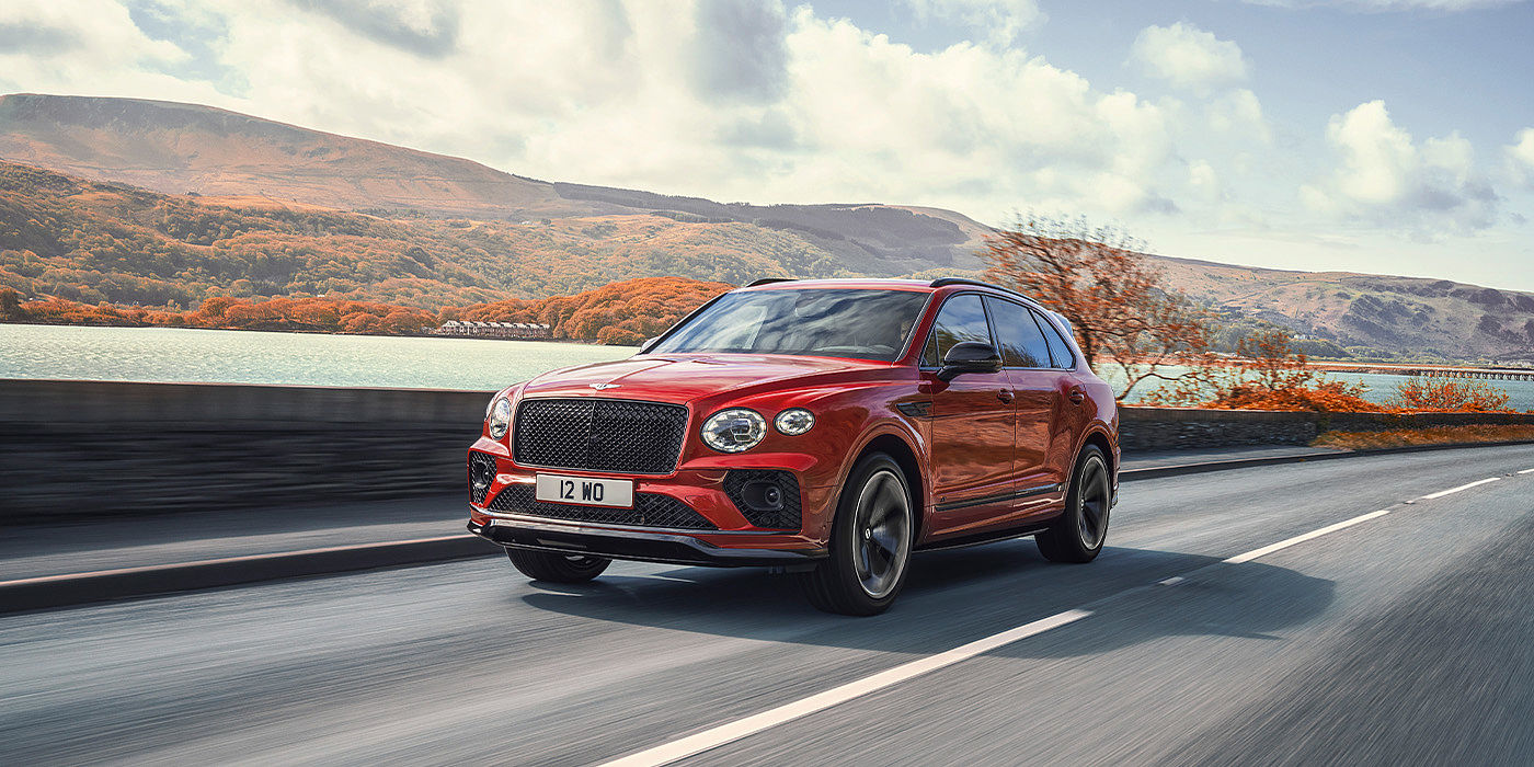 Bentley Doha Bentley Bentayga S SUV in Candy Red paint front 34 dynamic