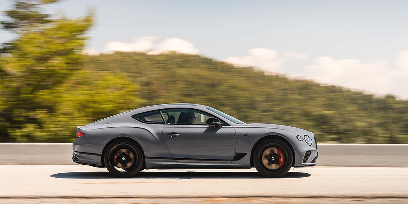 Bentley Doha Bentley Continental GT S coupe in Cambrian Grey paint profile dynamic driving