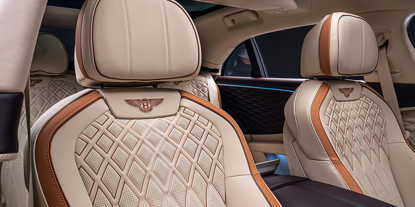 Bentley Doha Bentley Flying Spur Odyssean sedan rear seat detail with Diamond quilting and Linen and Burnt Oak hides
