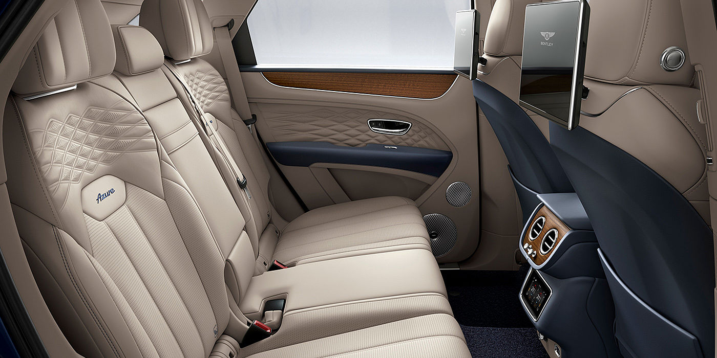 Bentley Doha Bentey Bentayga Azure interior view for rear passengers with Portland hide and Rear Seat Entertainment. 