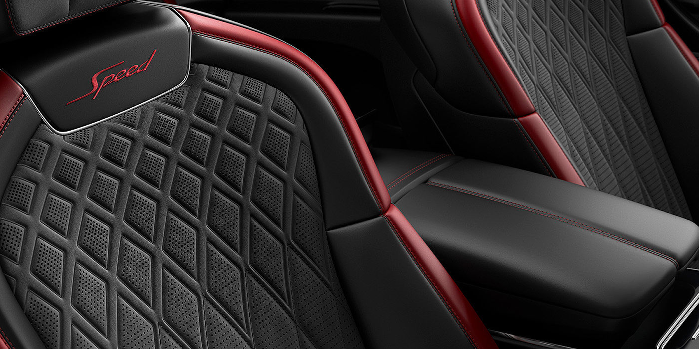 Bentley Doha Bentley Flying Spur Speed sedan seat stitching detail in Beluga black and Cricket Ball red hide