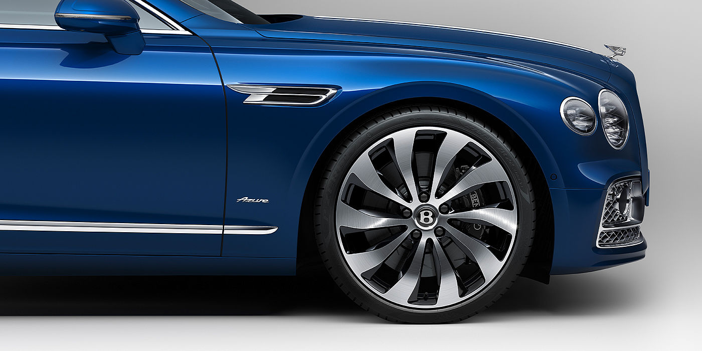 Bentley Doha Bentley Flying Spur Azure sedan side close up in Sequin Blue paint with Azure badge