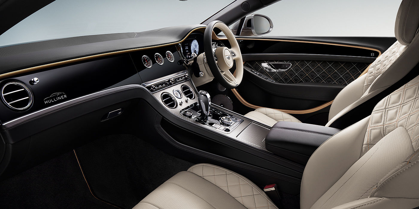 Bentley Doha Bentley Continental GT Mulliner coupe front interior in Beluga black and Linen hide