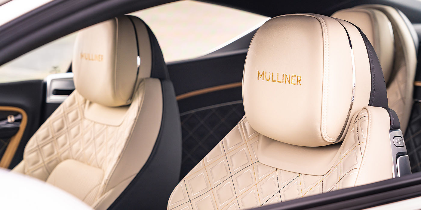 Bentley Doha Bentley Continental GT Mulliner coupe seat detail in Beluga black and Linen hide