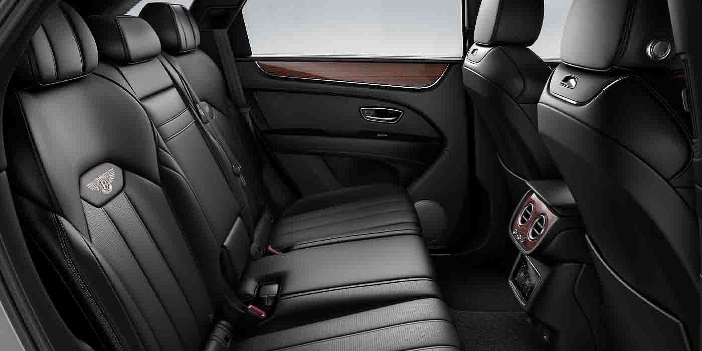 Bentley Doha Bentley Bentayga EWB interior view for rear passengers with Beluga black hide.